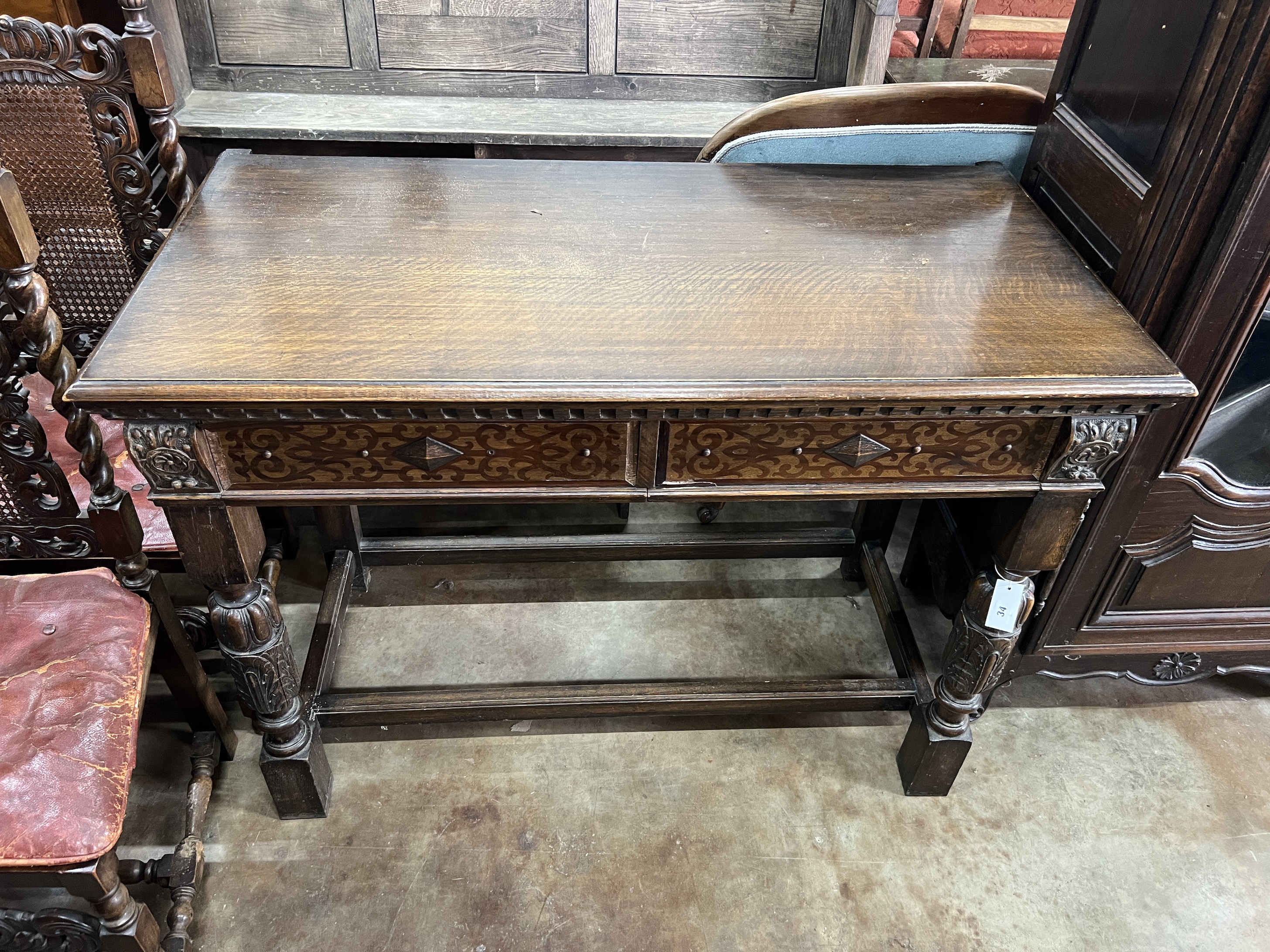 An 18th century style oak two drawer serving table, width 122cm, depth 61cm, height 92cm